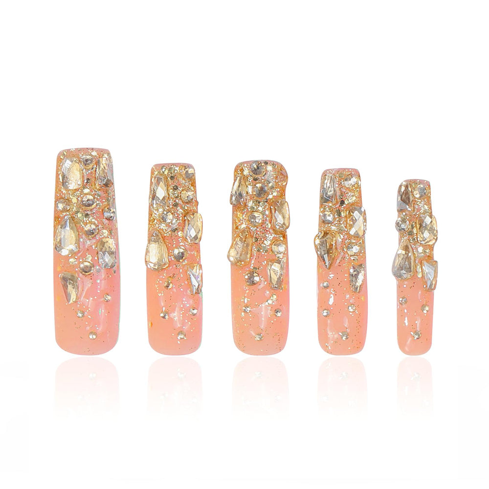 Lovful Stardust Nails closeup showing gold rhinestones for a luxe look