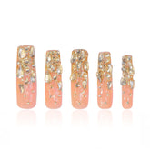 Lovful Stardust Nails closeup showing gold rhinestones for a luxe look