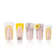 LOVFUL Sunflower press-on nails with full crystal cover for a premium at-home manicure.