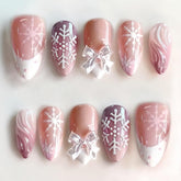 LRKNNO Christmas press-on nails in short almond shape for a festive manicure.