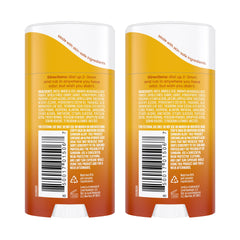 Applying Lume invisible cream stick to skin for long-lasting freshness.