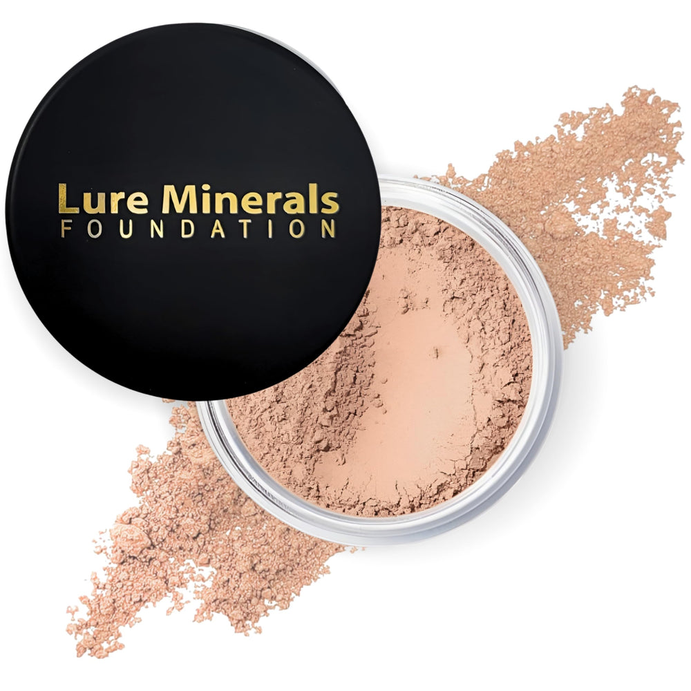 Lure Minerals foundation loose powder in 8g sifter jar for on-the-go touch-ups.