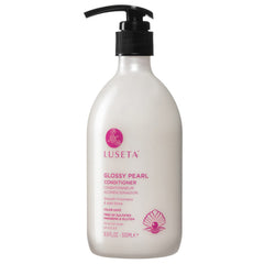 Luseta Glossy Pearl Conditioner bottle on shelf for shiny, smooth hair.