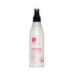 Luseta Glossy Pearl Leave-In Conditioner bottle pour adds instant shine and hydration.