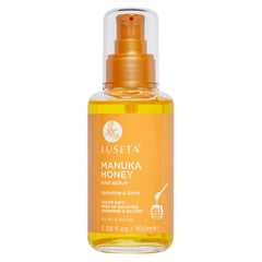 Luseta Manuka Honey Hair Oil bottle showing moisture for dry hair.