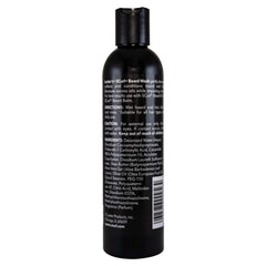 SCurl Beard Wash on shower shelf leaving hair soft and shiny.