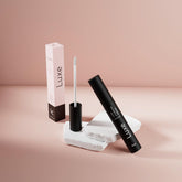 Packaging closeup of Luxe Cosmetics Eyebrow Serum highlights vegan cruelty-free ethics.