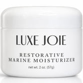 LuxeJoie Restorative Marine Moisturizer bottle highlighting lightweight hydration for sensitive skin