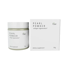 Luz Pearl Powder bottle close-up showcasing premium levigated pearl for skin support