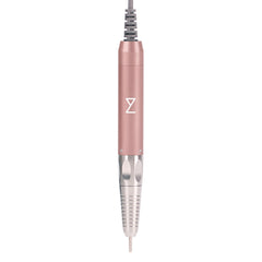 M Max Brushless handpiece in rose gold for precise salon-quality shaping.