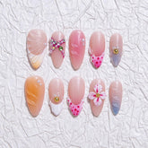 MABKJLF luxury press-on nails almond shape close-up with floral art for refined at-home manicures.