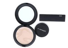 MAC Blot Powder Medium on face demonstrates subtle mattifying effect for long wear.