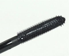 MAC Extreme Dimension 3D Lash brush arc coats lashes evenly and lifts.