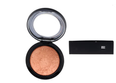 MAC Mineralize Skinfinish Cheeky Bronze swatch on skin highlights luminous bronze.