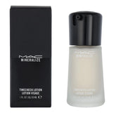 MAC Mineralize Timecheck Lotion bottle with sleek packaging for daily use and a subtle glow