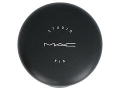 MAC Studio Fix powder applied with puff for even skin tone.
