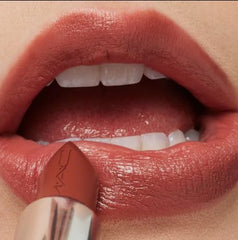 MAC Ximal Sleek Satin Lipstick application closeup demonstrating smooth glide