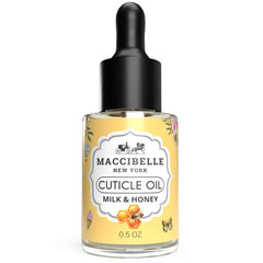 Maccibelle Cuticle Oil bottle with milk and honey scent nourishes dry cuticles.