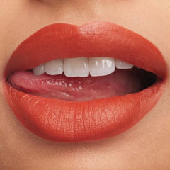 MAC Lipstick application showcases full-coverage color and lip conditioning