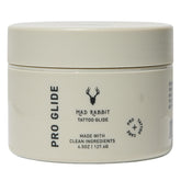 Mad Rabbit Tattoo Artist Glide bottle ready for professional tattooing with vegan formula.