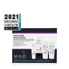 M.A.D Skincare travel bottles arranged for a compact anti-aging routine on the road.