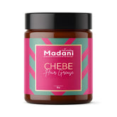 Madani Naturals Chebe Hair Grease jar for scalp hydration and nourishment.
