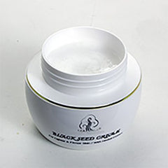 Madina Black Seed Face Cream jar presents creamy texture for easy application