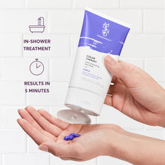Applying Madison Reed Color Therapy Perla mask in the shower for quick refresh