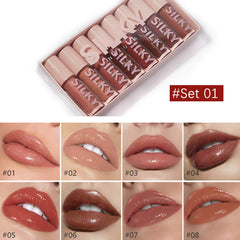 MAEPEOR gloss swatches reveal shimmer and cream finishes across eight shades.