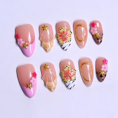 MAGLFELL hand model shows almond nails fitting comfortably and looking natural.