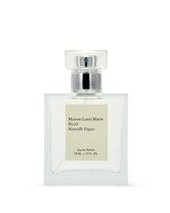 Maison Louis Marie No.13 Nouvelle Vague bottle pour highlights a radiant, long-lasting scent.