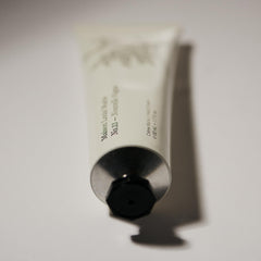 Dispensing action of No.13 Nouvelle Vague bottle demonstrates easy, mess-free application.