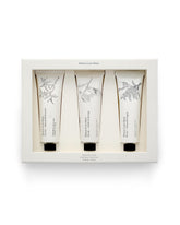 Maison Louis Marie No.04 Bois de Balincourt hand cream bottle close-up for smooth, hydrated skin.