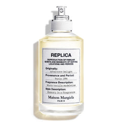 Maison Margiela Replica Afternoon Delight bottle highlights a warm gourmand fragrance for cozy evenings.