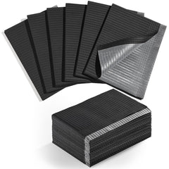 Makartt disposable nail mats folded for travel, providing hygienic protection on the go.