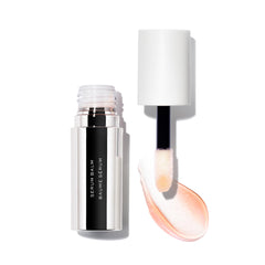 MAKE Halo Moon lip oil close-up delivering hydration with subtle pink tint.