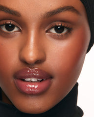 MAKE Beauty Serum Balm Lilac Layer shade on lips with subtle tint