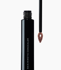 MAKE Beauty Skin Mimetic Concealer swatch shows seamless color match.
