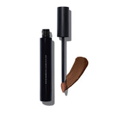 MAKE Beauty Skin Mimetic Concealer tube with natural, buildable coverage.