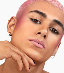 Refillable pan design for MAKE blush reduces waste.