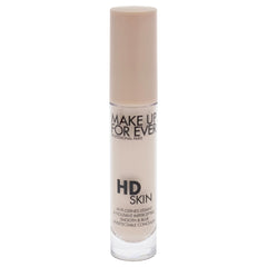 Make Up For Ever HD Skin Concealer being dabbed under the eye for brightening.