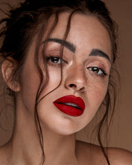 MAKI YIKA red lipstick on lips with rich matte finish