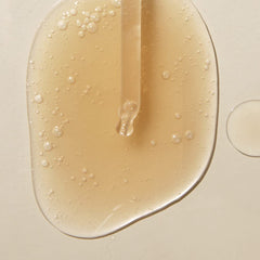Dropper disperses clear serum for quick absorption in MANYO formula.