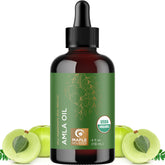 Maple Holistics Amla Oil bottle pour shows nourishing hair treatment.