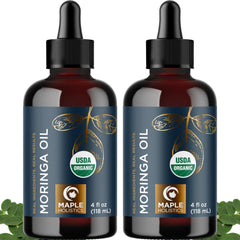 Maple Holistics Moringa Oil bottle pour showing hydrating scalp and hair benefits