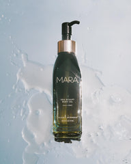 MARA Sea Sculpt Body Oil being massaged into thighs for improved texture