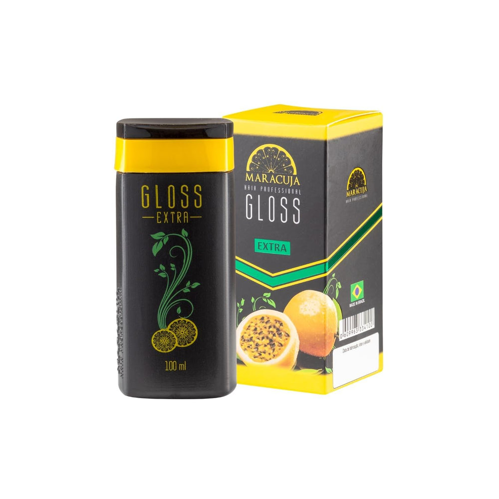 MARACUJA Maracuja Extra Gloss bottle pour demonstrates hydrating formula for smoother hair.