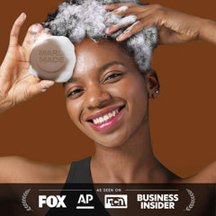 Mars Made Jojoba Oil Shampoo Bar 2.0 ingredients close-up: olive oil, coconut acid, cocoa.