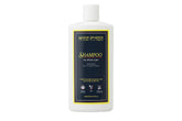 Mason Pearson Shampoo bottle being poured for all hair types, showcasing hydration and gentle cleansing.