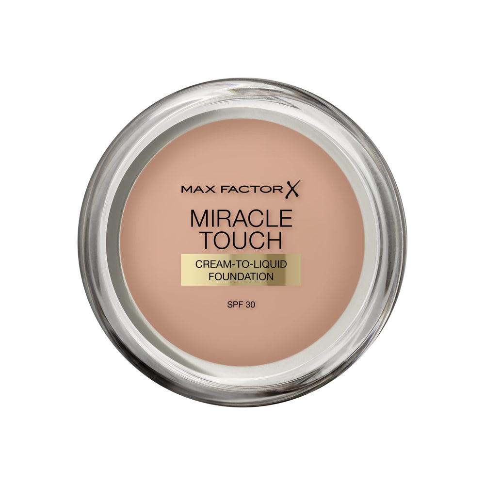 Max Factor Miracle Touch foundation bottle with pump for easy daily application.